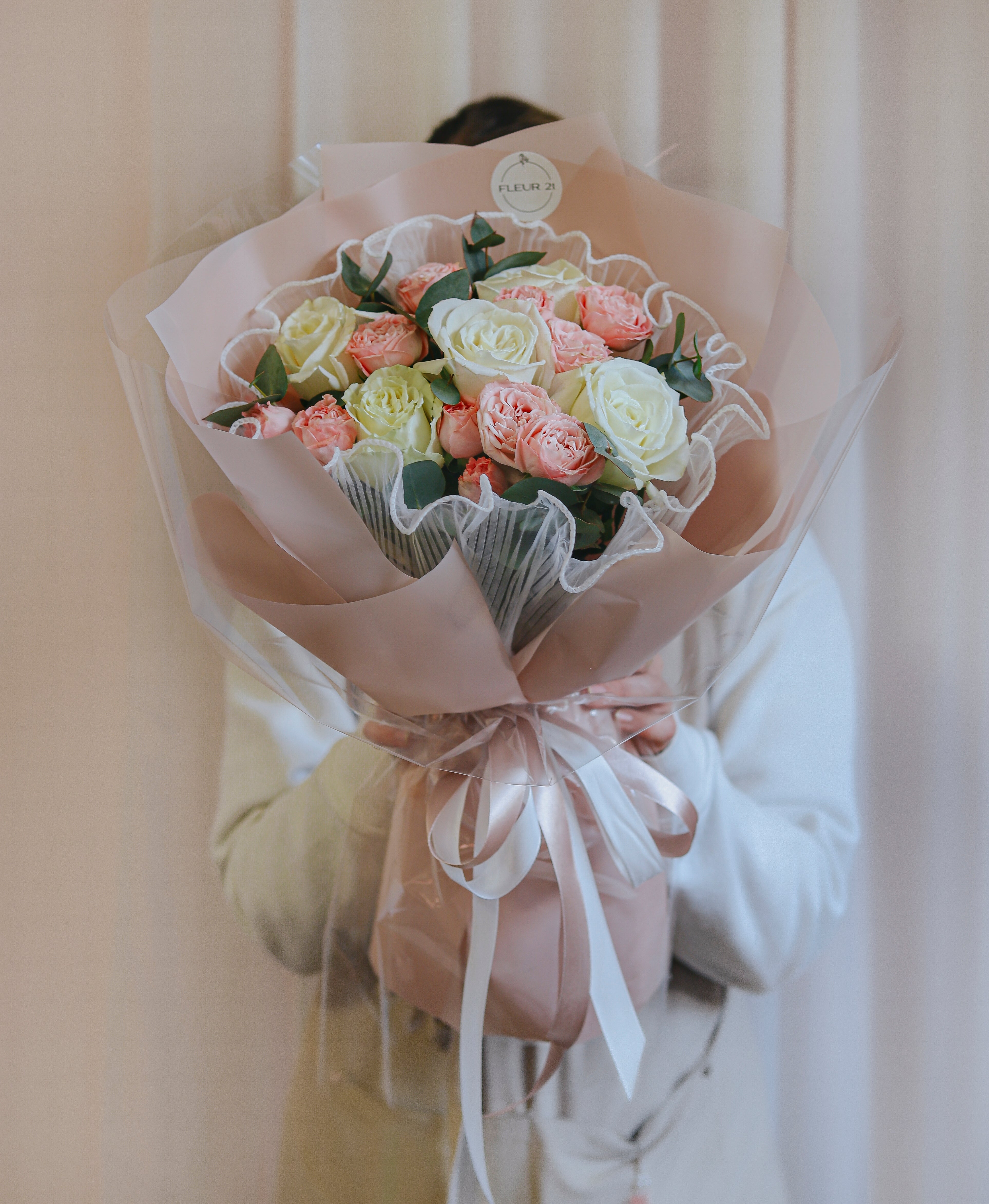 Bouquet of roses in tulle