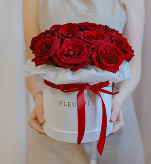 Červené růže v boxu