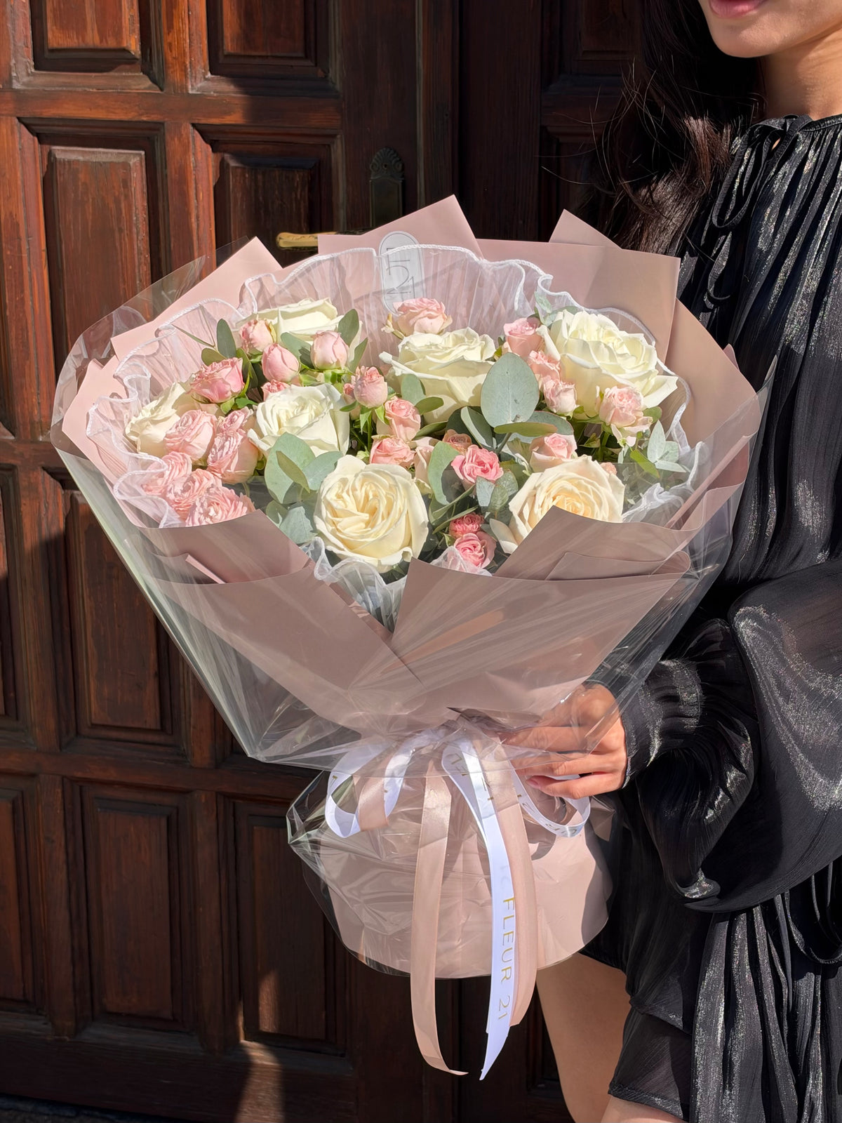 Bouquet of roses in tulle
