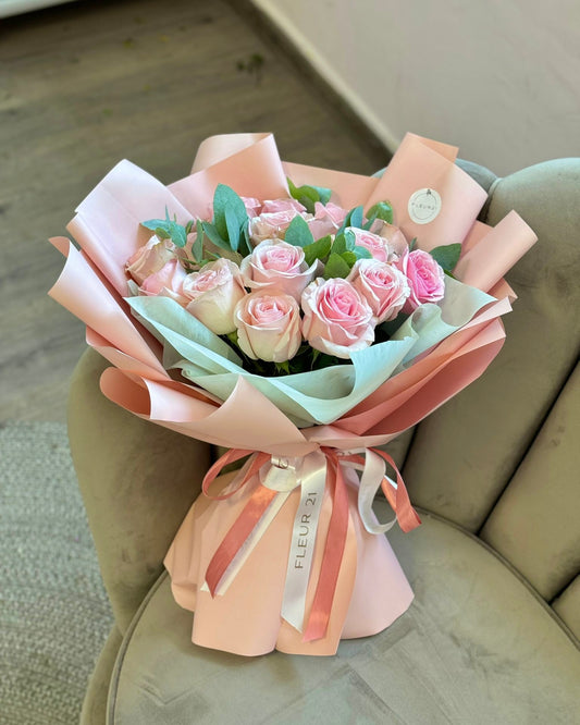 Pink roses with eucalyptus