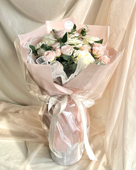 Bouquet of roses in tulle