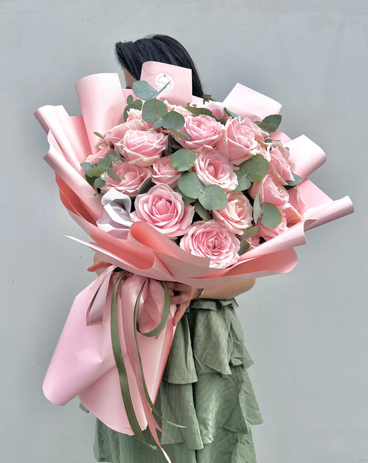 Pink roses with eucalyptus